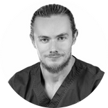 lukasz lassman headshot